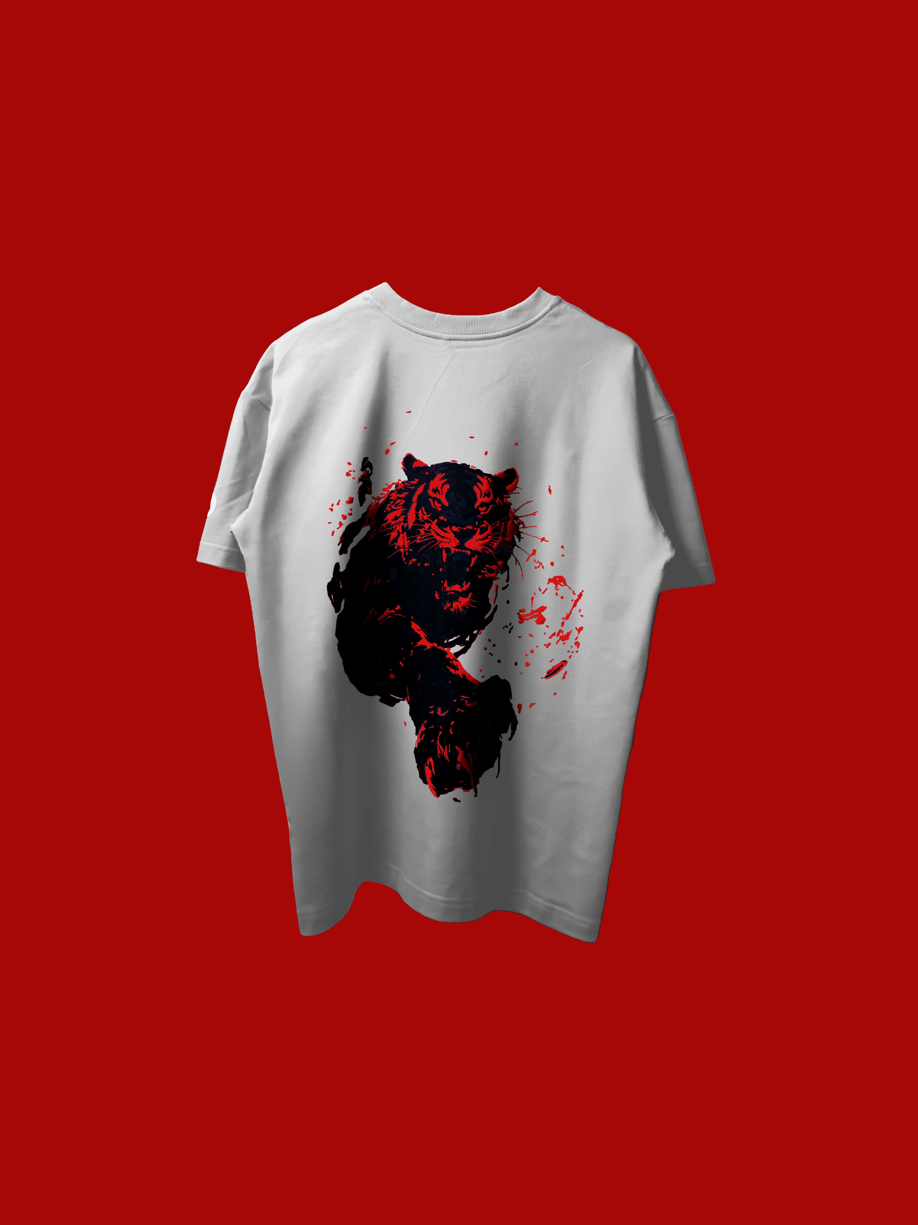 A white short-sleeve t-shirt with a large graphic print of a black and red tiger on the back, set against a solid red background.