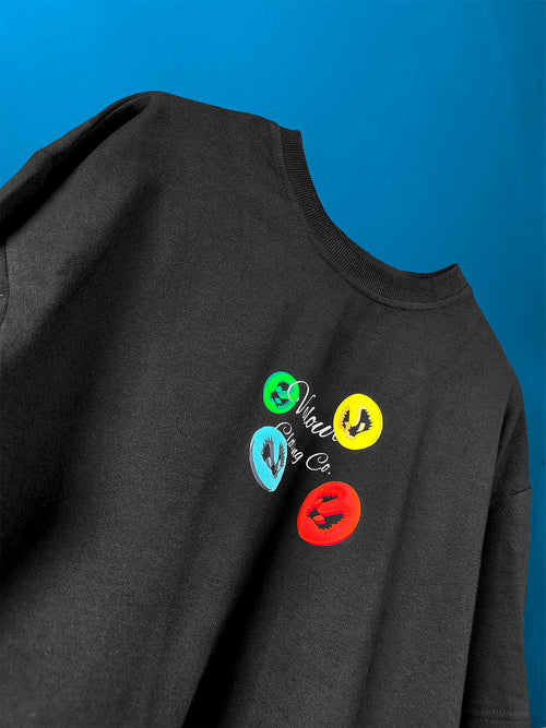 close-up of black oversized t-shirt with puff print neon Valour Logo and Valour Clothing Co text on chest